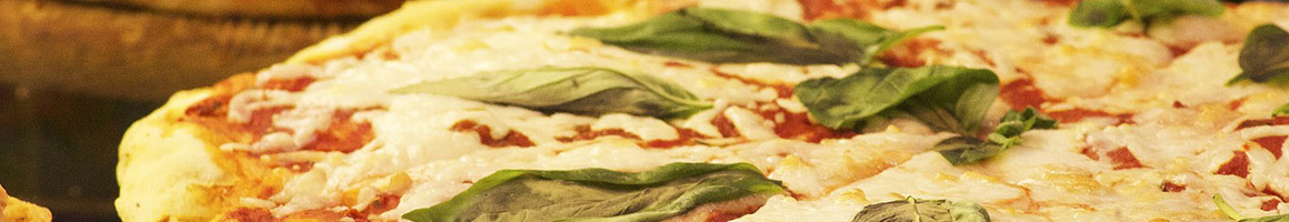 Eating American (Traditional) Italian Pizza at Manginos Pizza restaurant in Burke, VA.
